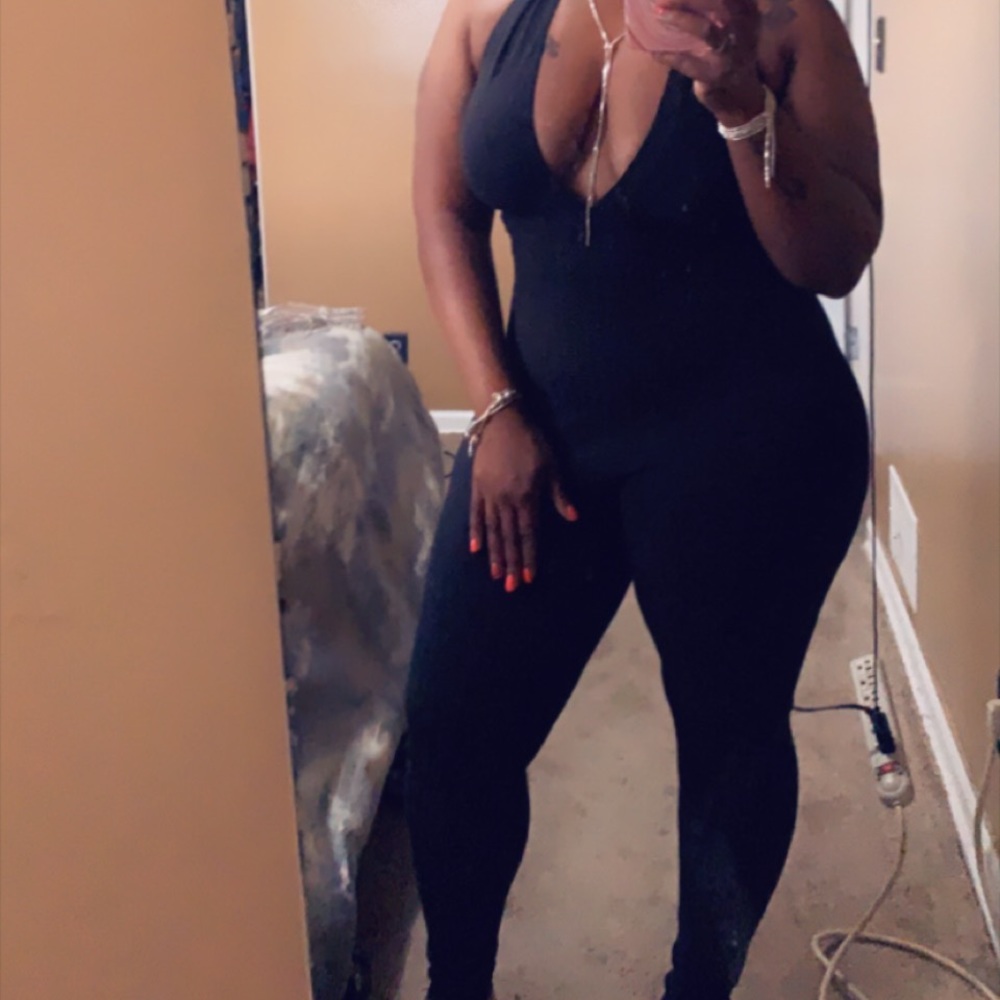 All black jumpsuit. Worn once. Fits great